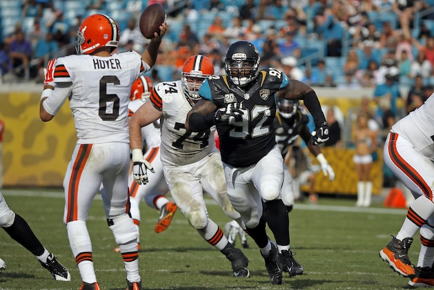 Jacksonville Jaguars defensive end Ziggy Hood (92) rushes Cleveland Browns quarterback Brian Hoyer (6) during the second half of an NFL football game, Sunday, Oct. 19, 2014, in Jacksonville, Fla. The Jaguars beat the Browns 24-6. (AP Photo/Stephen B. Morton)
