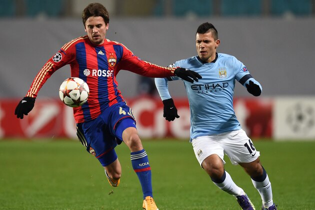 KHIMKI, RUSSIA - OCTOBER 21: Georgi Schennikov (L) of PFC CSKA Moscow challenged by Sergio Aguero of Manchester City FC during the UEFA Champions League Group E match between PFC CSKA Moscow and Manchester City FC at the Arena Khimki Stadium on October 21, 2014 in Khimki, Russia.  (Photo by Epsilon/Getty Images)