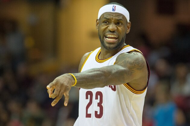 CLEVELAND, OH - OCTOBER 5: LeBron James #23 of the Cleveland Cavaliers yells to his teammates during the first half against Maccabi Tel Aviv at Quicken Loans Arena on October 5, 2014 in Cleveland, Ohio. NOTE TO USER: User expressly acknowledges and agrees that, by downloading and or using this photograph, User is consenting to the terms and conditions of the Getty Images License Agreement.  (Photo by Jason Miller/Getty Images)