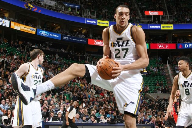 SALT LAKE CITY, UT - FEBRUARY 03:  Rudy Gobert #27 of the Utah Jazz grabs a rebound against the Toronto Raptors at EnergySolutions Arena on February 03, 2014 in Salt Lake City, Utah. NOTE TO USER: User expressly acknowledges and agrees that, by downloading and or using this Photograph, User is consenting to the terms and conditions of the Getty Images License Agreement. Mandatory Copyright Notice: Copyright 2014 NBAE (Photo by Melissa Majchrzak/NBAE via Getty Images)