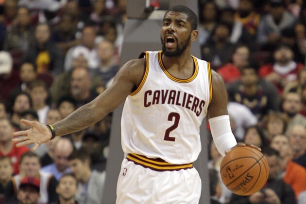Cleveland Cavaliers' Kyrie Irving plays against the Chicago Bulls in an NBA preseason basketball game Monday, Oct. 20, 2014, in Columbus, Ohio. (AP Photo/Jay LaPrete)