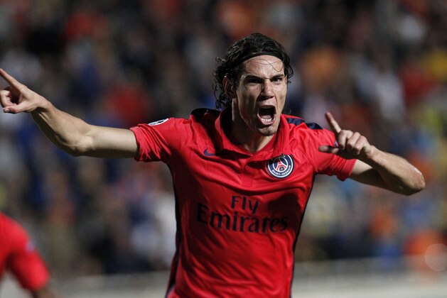 PSG's Edinson Cavani, celebrates after scoring against Apoel during the Champions League Group F soccer match between Apoel and Paris Saint Germain, at GSP stadium, Tuesday, Oct. 21, 2014. (AP Photo/Petros Karadjias) PSG's Edinson Cavani, celebrates after scoring against Apoel during the Champions League Group F soccer match between Apoel and Paris Saint Germain, at GSP stadium, Tuesday, Oct. 21, 2014. (AP Photo/Petros Karadjias)