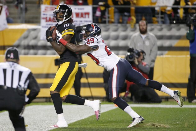 Pittsburgh Steelers wide receiver Martavis Bryant (10) makes a touchdown catch after getting by Houston Texans defensive back Andre Hal (29) in the second quarterof the NFL football game, Monday, Oct. 20, 2014 in Pittsburgh. (AP Photo/Gene J. Puskar)