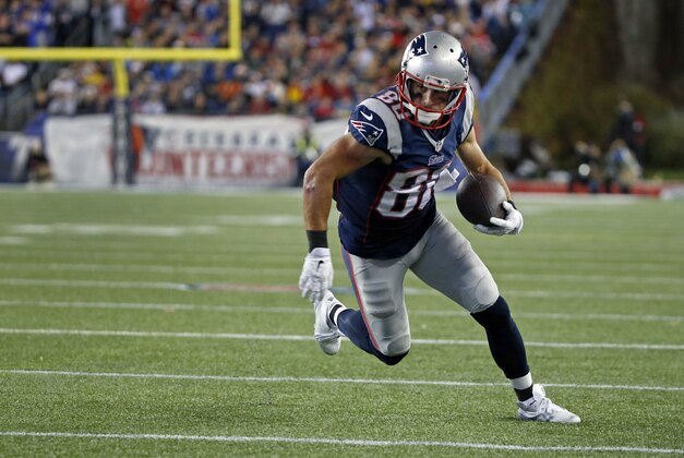 New England Patriots wide receiver Danny Amendola (80) runs for yardage in the second half of an NFL football game against the New York Jets, Thursday, Oct. 16, 2014, in Foxborough, Mass. (AP Photo/Elise Amendola)