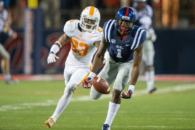 OXFORD, MS - OCTOBER 18: Wide receiver Laquon Treadwell #1 of the Mississippi Rebels attempts to catch a pass in front of defensive back Cameron Sutton #23 of the Tennessee Volunteers on October 18, 2014 at Vaught-Hemingway Stadium in Oxford, Mississippi. At halftime the Mississippi Rebels leads the Tennessee Volunteers 14-3. (Photo by Michael Chang/Getty Images)