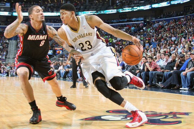 NEW ORLEANS, LA - MARCH 22:  Anthony Davis #23 of the New Orleans Pelicans handles the ball against the Miami Heat on March 22, 2014 at the Smoothie King Center in New Orleans, Louisiana. NOTE TO USER: User expressly acknowledges and agrees that, by downloading and or using this Photograph, user is consenting to the terms and conditions of the Getty Images License Agreement. Mandatory Copyright Notice: Copyright 2014 NBAE (Photo by Layne Murdoch Jr./NBAE via Getty Images)
