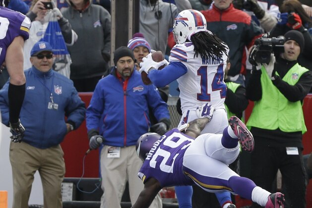 Buffalo Bills wide receiver Sammy Watkins (14) catches the game tying touchdown against Minnesota Vikings corner back Xavier Rhodes (29) in the final seconds of their NFL football game Sunday, Oct. 19, 2014, in Orchard Park, N.Y.  The Bills won the game 17-16. (AP Photo/Bill Wippert)
