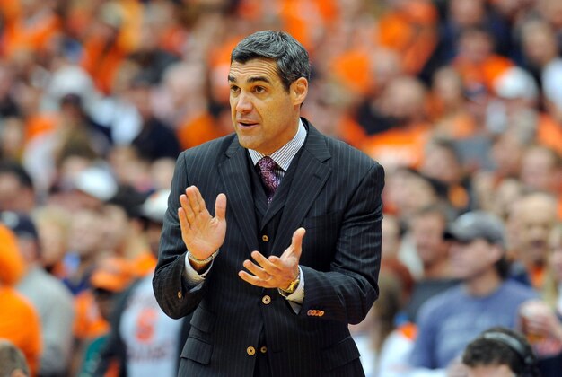 Dec 28, 2013; Syracuse, NY, USA; Villanova Wildcats head coach Jay Wright cheers for his team against the Syracuse Orange during the first half at the Carrier Dome.  Mandatory Credit: Rich Barnes-USA TODAY Sports