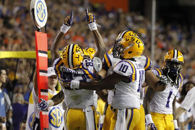Oct 11, 2014; Gainesville, FL, USA;LSU Tigers wide receiver Travin Dural (83) reacts with teammates after he scored a touchdown against the Florida Gators during the second half at Ben Hill Griffin Stadium. LSU Tigers defeated the Florida Gators 30-27. Mandatory Credit: Kim Klement-USA TODAY Sports