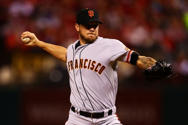 ST LOUIS, MO - OCTOBER 12:  Jake Peavy #22 of the San Francisco Giants pitches in the first inning against the St. Louis Cardinals during Game Two of the National League Championship Series at Busch Stadium on October 12, 2014 in St Louis, Missouri.  (Photo by Dilip Vishwanat/Getty Images)