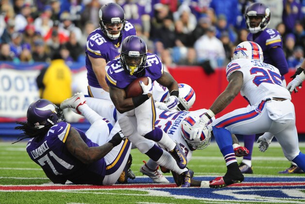 Minnesota Vikings running back Jerick McKinnon (31) rushes during the second half of an NFL football game against the Buffalo Bills Sunday, Oct. 19, 2014, in Orchard Park, N.Y.  (AP Photo/Gary Wiepert)