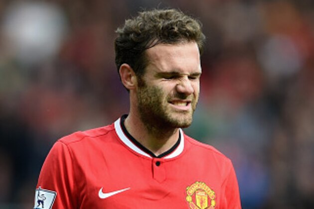 MANCHESTER, ENGLAND - OCTOBER 05: Juan Mata of Manchester United looks on during the Barclays Premier League match between Manchester United and Everton at Old Trafford on October 5, 2014 in Manchester, England.  (Photo by Michael Regan/Getty Images)