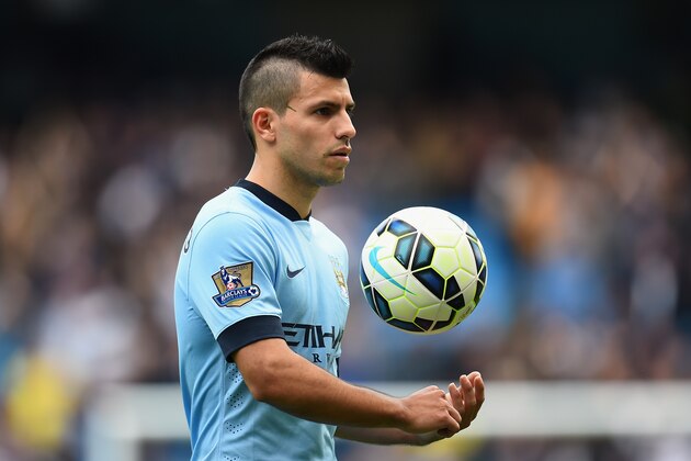 MANCHESTER, ENGLAND - OCTOBER 18:  Sergio Aguero of Manchester City leaves the pitch with the match ball after scoring four goals during the Barclays Premier League match between Manchester City and Tottenham Hotspur at Etihad Stadium on October 18, 2014 in Manchester, England.  (Photo by Shaun Botterill/Getty Images)