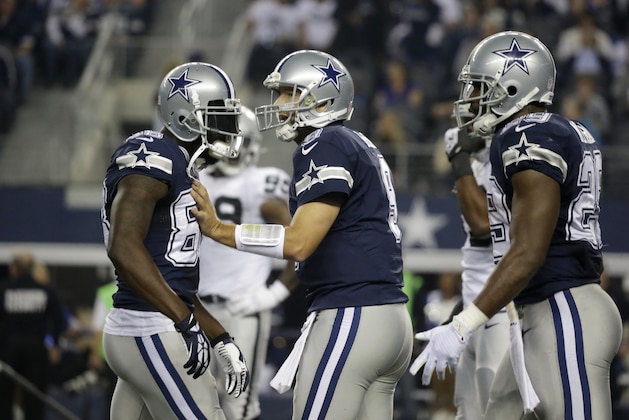 Dallas Cowboys wide receiver Dez Bryant (88), quarterback Tony Romo (9) and running back DeMarco Murray (29) get ready for a play during the second half of an NFL football game against the Oakland Raiders Thursday, Nov. 28, 2013, in Arlington, Texas.  (AP Photo/LM Otero)