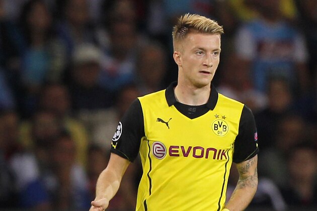 NAPLES, ITALY - SEPTEMBER 18:  Marco Reus of Borussia Dortmund in action during the Uefa Champions League Group F match between Napoli and Borussia Dortmund at Stadio San Paolo on September 18, 2013 in Naples, Italy.  (Photo by Paolo Bruno/Getty Images)