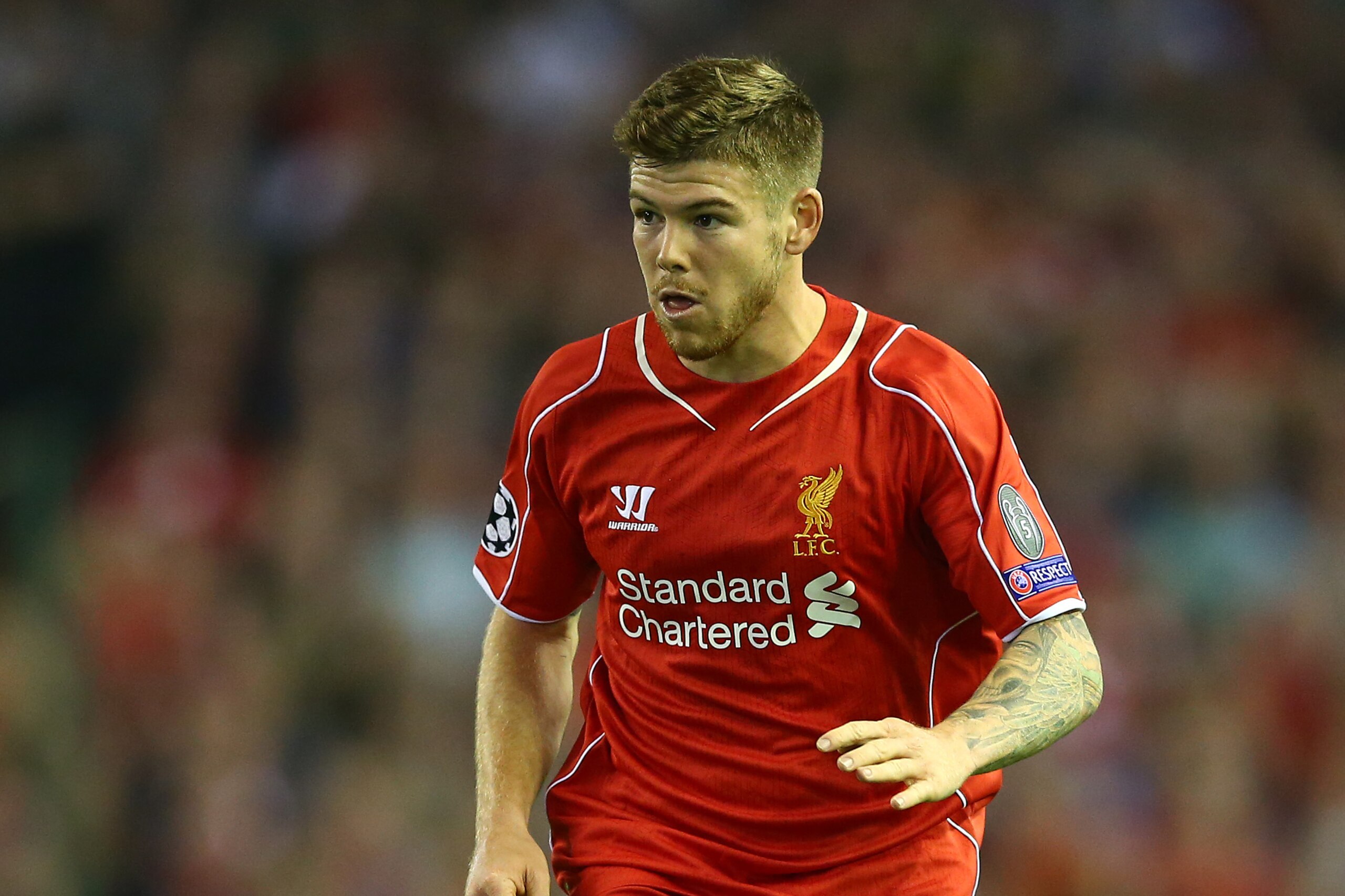 LIVERPOOL, ENGLAND - SEPTEMBER 16:  Alberto Moreno of Liverpool in action during the UEFA Champions League group B match between Liverpool FC and PFC Ludogorets Razgrad at Anfield on September 16, 2014 in Liverpool, United Kingdom.  (Photo by Clive Brunskill/Getty Images)
