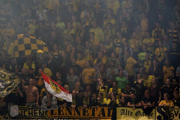 ANDERLECHT, BELGIUM - OCTOBER 01: Borussia Dortmund show their support during the Group D UEFA Champions League match between RSC Anderlecht and Borussia Dortmund held at Constant Vanden Stock Stadium on October 1, 2014 in Anderlecht, Belgium.  (Photo by Dean Mouhtaropoulos/Getty Images)