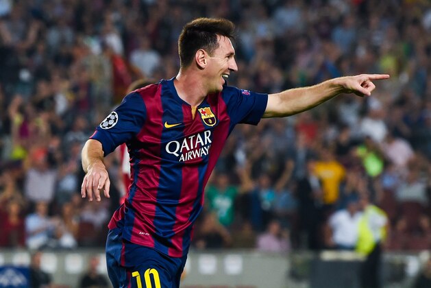 BARCELONA, SPAIN - OCTOBER 21:  Lionel Messi of FC Barcelona celebrates after scoring his team's second goal during a UEFA Champions League Group F match between FC Barcelona and AFC Ajax at the Camp Nou Stadium on October 21, 2014 in Barcelona, Spain.  (Photo by David Ramos/Getty Images)