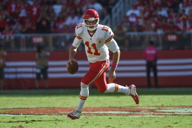 October 5, 2014; Santa Clara, CA, USA; Kansas City Chiefs quarterback Alex Smith (11) looks for a receiver against the San Francisco 49ers during the third quarter at Levi's Stadium. The 49ers defeated the Chiefs 22-17. Mandatory Credit: Kyle Terada-USA TODAY Sports