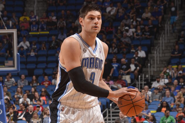 ORLANDO, FL - MARCH 2:  Nikola Vucevic #9 of the Orlando Magic handles the ball during a game against the Philadelphia 76ers on March 2, 2014 at Amway Center in Orlando, Florida. NOTE TO USER: User expressly acknowledges and agrees that, by downloading and or using this photograph, User is consenting to the terms and conditions of the Getty Images License Agreement. Mandatory Copyright Notice: Copyright 2014 NBAE  (Photo by Fernando Medina/NBAE via Getty Images)