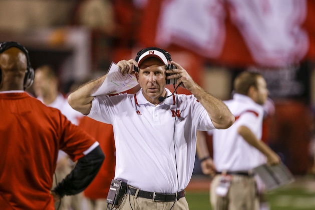 Nebraska head coach Bo Pelini adjusts his head set in the second half of an NCAA college football game against Miami in Lincoln, Neb., Saturday, Sept. 20, 2014. Nebraska won 41-31. (AP Photo/Nati Harnik)