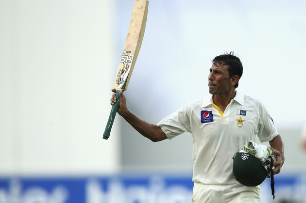 DUBAI, UNITED ARAB EMIRATES - OCTOBER 22:  Younis Khan of Pakistan leaves the ground after being dismissed for 106 runs by Mitchell Johnson of Australia during Day One of the First Test between Pakistan and Australia at Dubai International Stadium on October 22, 2014 in Dubai, United Arab Emirates.  (Photo by Ryan Pierse/Getty Images)