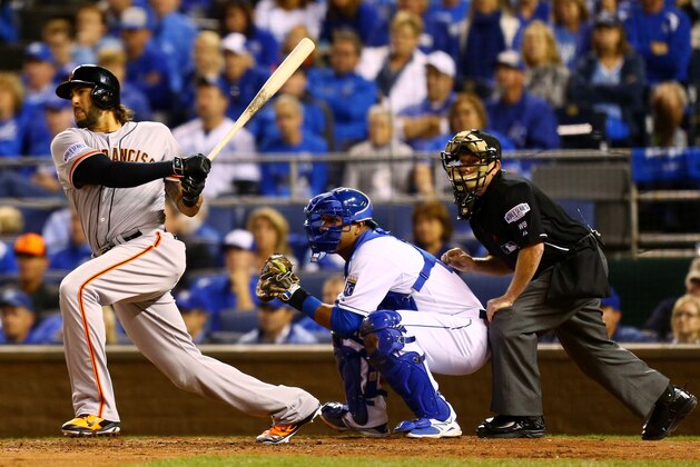 KANSAS CITY, MO - OCTOBER 21:  Michael Morse #38 of the San Francisco Giants hits an RBI single in the fourth inning against the Kansas City Royals during Game One of the 2014 World Series at Kauffman Stadium on October 21, 2014 in Kansas City, Missouri.  (Photo by Dilip Vishwanat/Getty Images)