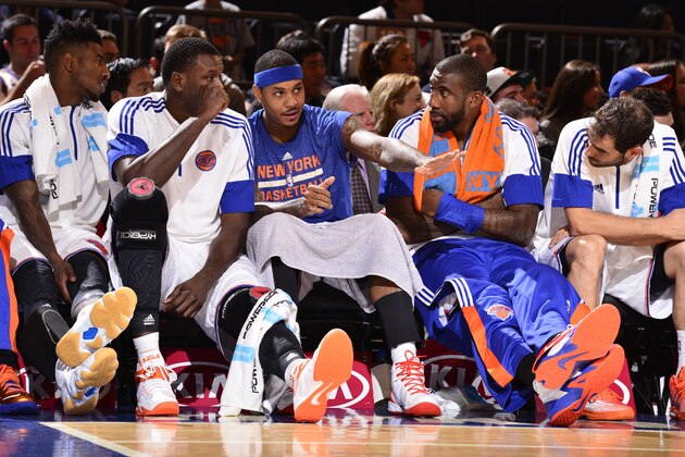 NEW YORK, NY - OCTOBER 13:  Carmelo Anthony #7 of the New York Knicks speaks with his teammates during a game against the Toronto Raptors at Madison Square Garden on October 13, 2014 in New York City, New York. NOTE TO USER: User expressly acknowledges and agrees that, by downloading and or using this photograph, User is consenting to the terms and conditions of the Getty Images License Agreement. Mandatory Copyright Notice: Copyright 2014 NBAE  (Photo by David Dow/NBAE via Getty Images)