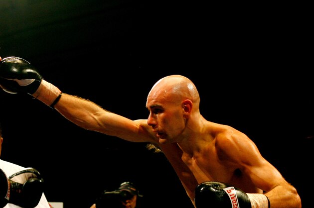 LONDON, ENGLAND - FEBRUARY 12:  Stuart Hall (R) lands a punch on Richard Szelebedi in their bout at York Hall on February 12, 2010 in London, England.  (Photo by Dean Mouhtaropoulos/Getty Images)