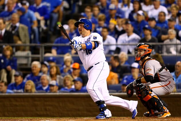 KANSAS CITY, MO - OCTOBER 21:  Billy Butler #16 of the Kansas City Royals hits a single in the second inning against the San Francisco Giants during Game One of the 2014 World Series at Kauffman Stadium on October 21, 2014 in Kansas City, Missouri.  (Photo by Dilip Vishwanat/Getty Images)