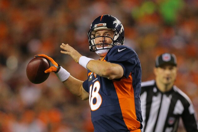 DENVER, CO - OCTOBER 19:  Quarterback Peyton Manning #18 of the Denver Broncos throws a pass against the San Francisco 49ers during the second quarter of a game at Sports Authority Field at Mile High on October 19, 2014 in Denver, Colorado.  (Photo by Justin Edmonds/Getty Images)