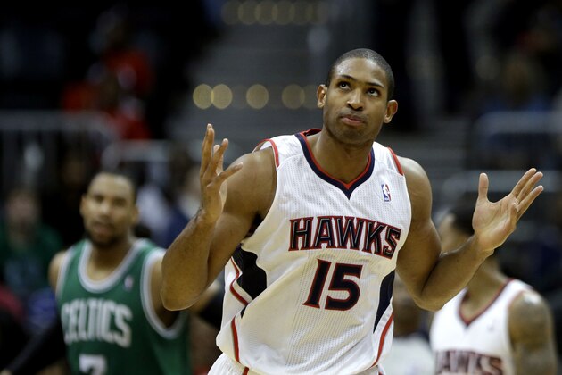 Atlanta Hawks' Al Horford gestures after making a shot during the fourth quarter of an NBA basketball game against the Boston Celtics, Saturday, Nov. 23, 2013, in Atlanta. (AP Photo/David Goldman)
