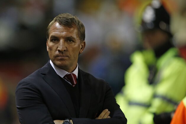 Liverpool's head coach Brendan Rodgers stands on the touchline before the Champions League group B soccer match between Liverpool and Real Madrid at Anfield Stadium, Liverpool, England, Wednesday Oct. 22, 2014. (AP Photo/Jon Super)