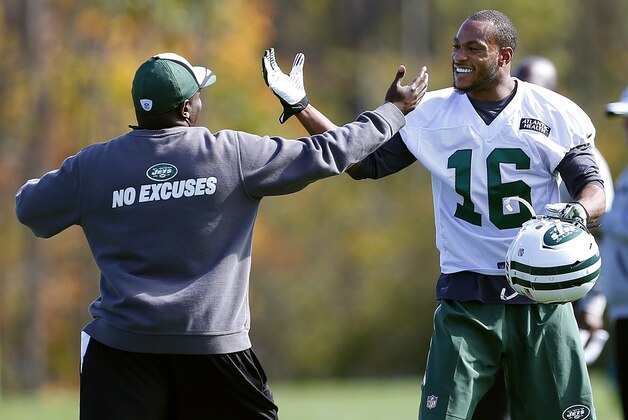 New York Jets wide receiver Percy Harvin (16) is greeted by assistant strength and conditioning coach Aaron McLaurin, left, while working out during NFL football practice in Florham Park, N.J., Monday, Oct. 20, 2014. (AP Photo/Rich Schultz)