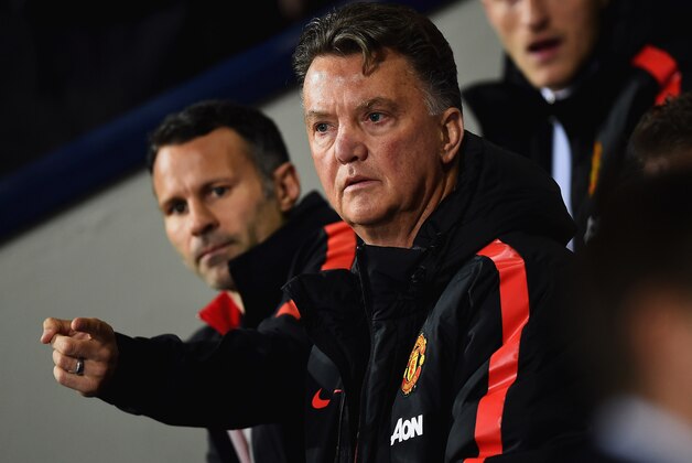 WEST BROMWICH, ENGLAND - OCTOBER 20:  Louis van Gaal manager of Manchester United and assistant Ryan Giggs look on from the bench during the Barclays Premier League match between West Bromwich Albion and Manchester United at The Hawthorns on October 20, 2014 in West Bromwich, England.  (Photo by Laurence Griffiths/Getty Images)