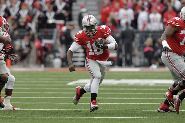 Ohio State quarterback J.T. Barrett plays against Rutgers during an NCAA NCAA college football game Saturday, Oct. 18, 2014, in Columbus, Ohio. (AP Photo/Jay LaPrete) Ohio State quarterback J.T. Barrett plays against Rutgers during an NCAA NCAA college football game Saturday, Oct. 18, 2014, in Columbus, Ohio. (AP Photo/Jay LaPrete)