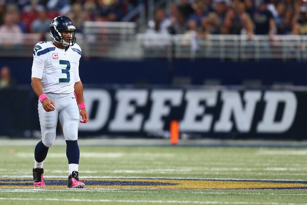 ST. LOUIS, MO - OCTOBER 19: Russell Wilson #3 of the Seattle Seahawks looks to the sideline in the first quarter against the St. Louis Rams at the Edward Jones Dome on October 19, 2014 in St. Louis, Missouri.  The Rams beat the Seahawks 28-26.  (Photo by Dilip Vishwanat/Getty Images)