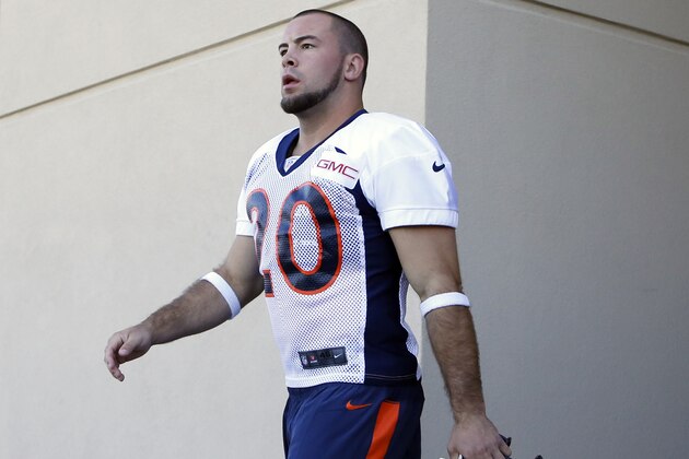 Denver Broncos' John Boyett takes to the field during the first day of NFL football training camp on Thursday, July 24, 2014, in Englewood, Colo. (AP Photo/Jack Dempsey)
