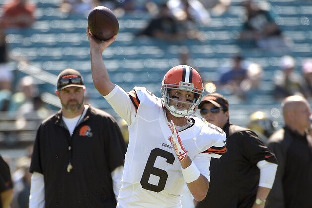 Cleveland Browns quarterback Brian Hoyer (6) throws during warmups before an NFL football game against the Jacksonville Jaguars in Jacksonville, Fla., Sunday, Oct. 19, 2014.(AP Photo/Phelan M. Ebenhack)