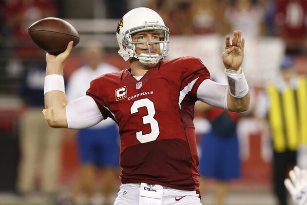 Arizona Cardinals quarterback Carson Palmer (3) throws against the San Diego Chargers during the second half of an NFL football game, Monday, Sept. 8, 2014, in Glendale, Ariz. (AP Photo/Ross D. Franklin)