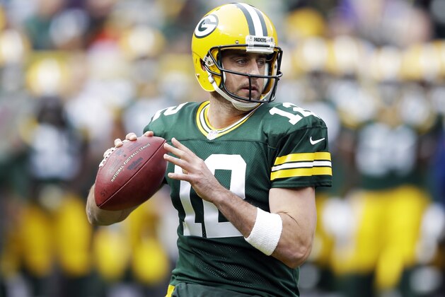 El mariscal de campo Aaron Rodgers de los Packers de Green Bay durante el partido ante los Panthers de Carolina, el domingo 19 de octubre de 2014. (AP Foto/Tom Lynn)