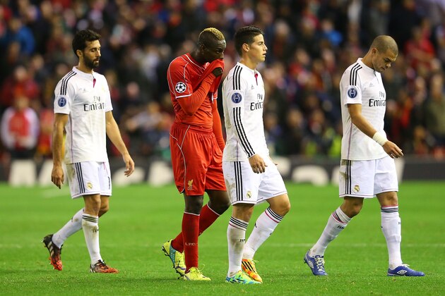 LIVERPOOL, ENGLAND - OCTOBER 22:  Mario Balotelli of Liverpool walks off dejectedly during the UEFA Champions League Group B match between Liverpool and Real Madrid CF on October 22, 2014 in Liverpool, United Kingdom.  (Photo by Alex Livesey/Getty Images)