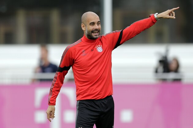 Bayern's head coach Pep Guardiola of Spain gestures during a training session prior to the Champions League Group E soccer match against AS Roma in Munich, southern Germany, Monday  Oct. 20, 2014. Bayern  Munich will face Rome on Tuesday. (AP Photo/Matthias Schrader)