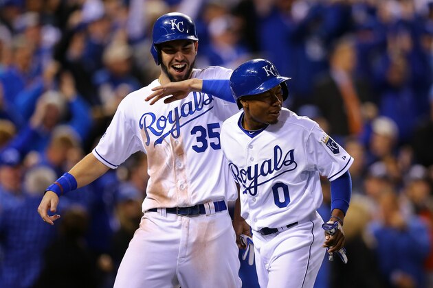 KANSAS CITY, MO - OCTOBER 22:  Eric Hosmer #35 celebrates with Terrance Gore #0 of the Kansas City Royals after scoring in the sixth inning against the San Francisco Giants during Game Two of the 2014 World Series at Kauffman Stadium on October 22, 2014 in Kansas City, Missouri.  (Photo by Elsa/Getty Images)