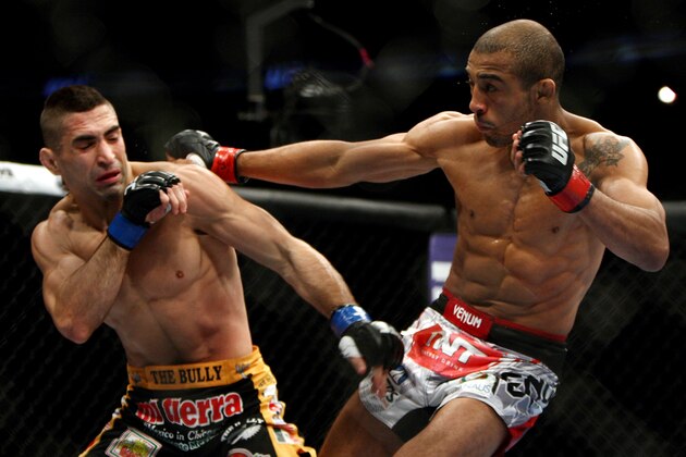 Jose Aldo, right, of Brazil and Ricardo Lamas of Chicago, IL fight in the second round of the Ultimate Fighting Featherweight Championship Mix Martial Arts bout in Newark, N.J. on Saturday, Feb. 1, 2014. Aldo won by unanimous decision in five rounds. (AP Photo/Tim Larsen)