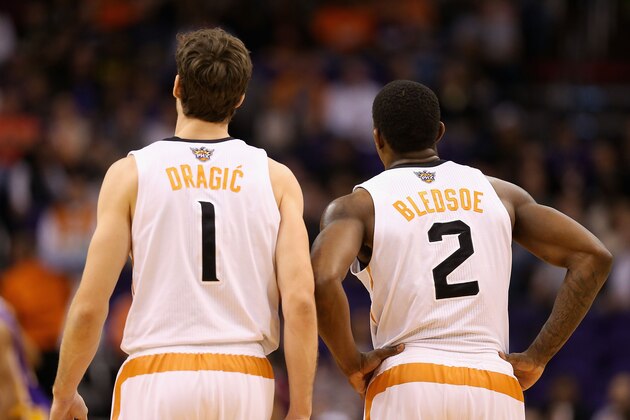 PHOENIX, AZ - DECEMBER 23:  Goran Dragic #1 and Eric Bledsoe #2 of the Phoenix Suns during the NBA game against the Los Angeles Lakers at US Airways Center on December 23, 2013 in Phoenix, Arizona.  NOTE TO USER: User expressly acknowledges and agrees that, by downloading and or using this photograph, User is consenting to the terms and conditions of the Getty Images License Agreement.  (Photo by Christian Petersen/Getty Images)