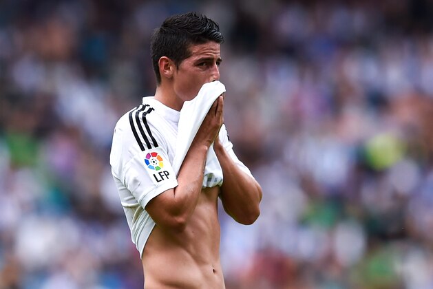 LA CORUNA, SPAIN - SEPTEMBER 20:  James Rodriguez of Real Madrid CF looks on during the La Liga match between RC Deportivo La Coruna and Real Madrid CF at Riazor Stadium on September 20, 2014 in La Coruna, Spain.  (Photo by David Ramos/Getty Images)