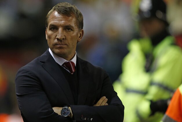 Liverpool's head coach Brendan Rodgers stands on the touchline before the Champions League group B soccer match between Liverpool and Real Madrid at Anfield Stadium, Liverpool, England, Wednesday Oct. 22, 2014. (AP Photo/Jon Super)