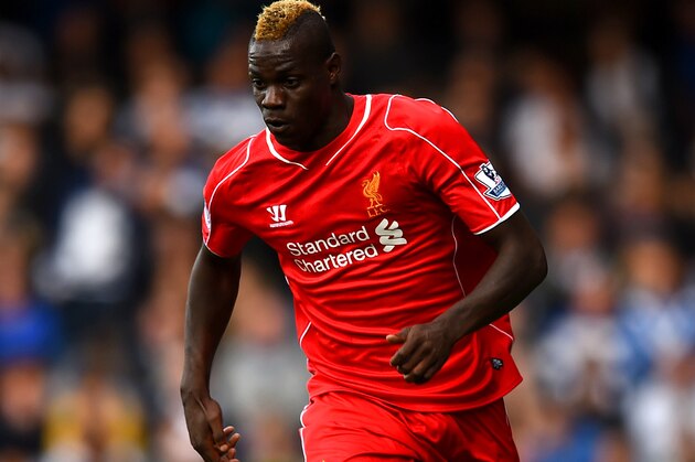 LONDON, ENGLAND - OCTOBER 19:  Mario Balotelli of Liverpool in action during the Barclays Premier League match between Queens Park Rangers and Liverpool at Loftus Road on October 19, 2014 in London, England.  (Photo by Paul Gilham/Getty Images)