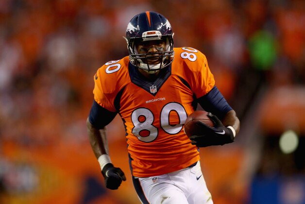 DENVER, CO - SEPTEMBER 07:  Tight end Julius Thomas #80 of the Denver Broncos carries the ball against the Indianapolis Colts at Sports Authority Field at Mile High on September 7, 2014 in Denver, Colorado.  (Photo by Jeff Gross/Getty Images)